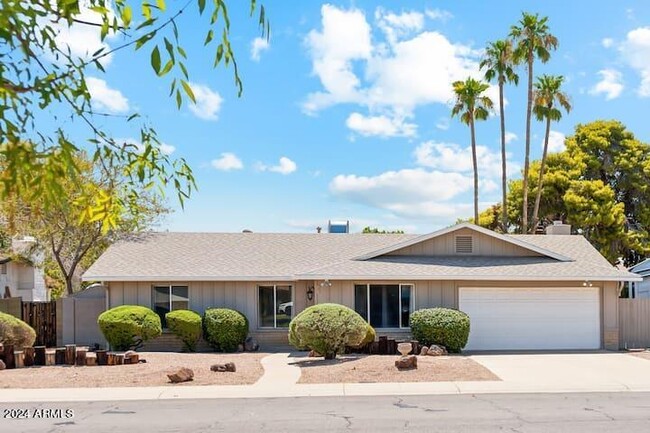 property at 3209 S Los Feliz Dr