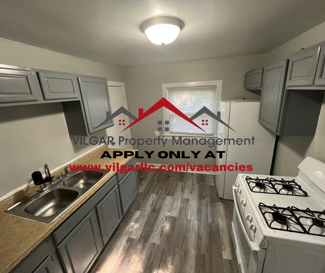 property at 6065 E 6th Pl
