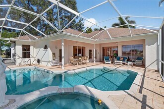 6687 Huntley Ln S in Naples, FL - Foto de edificio - Building Photo