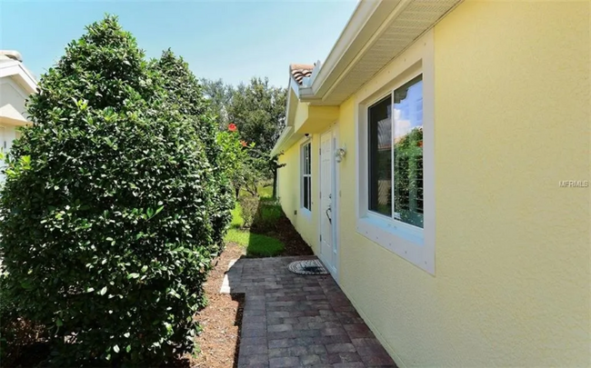 6058 Benevento Dr in Sarasota, FL - Foto de edificio - Building Photo