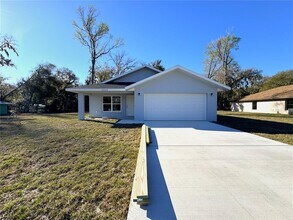 8808 E Albertson Ct in Floral City, FL - Building Photo - Building Photo