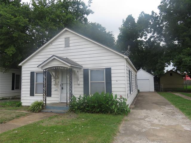 122 W Monterey St in Denison, TX - Building Photo