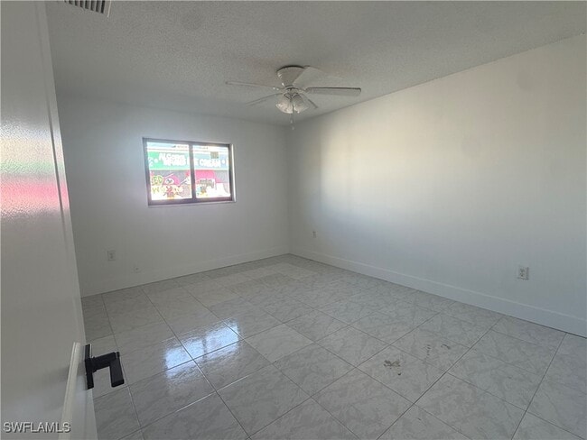 property at 3318 Del Prado Blvd S