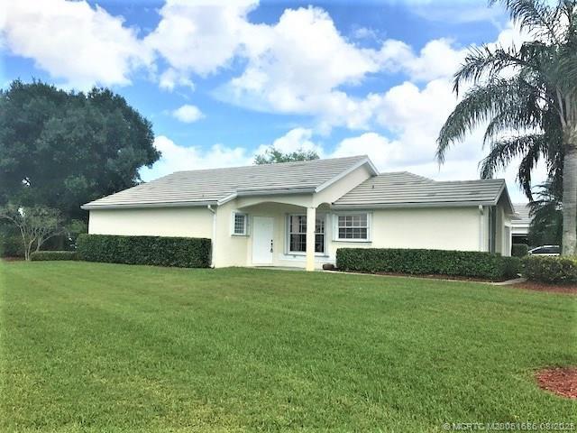 property at 3486 SW Pindo Palm Ln