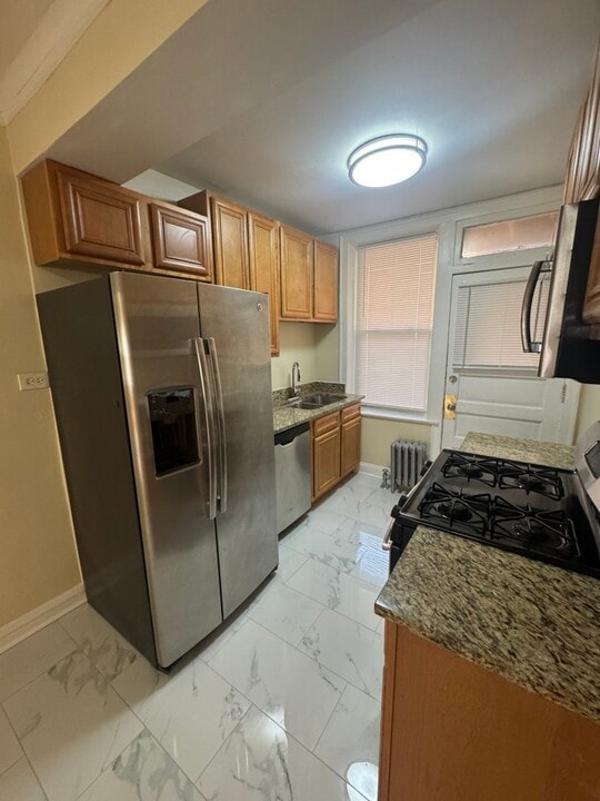 6217 N Mozart St, Unit 2E in Chicago, IL - Foto de edificio