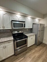 8620 SW 212th St in Cutler Bay, FL - Building Photo - Building Photo