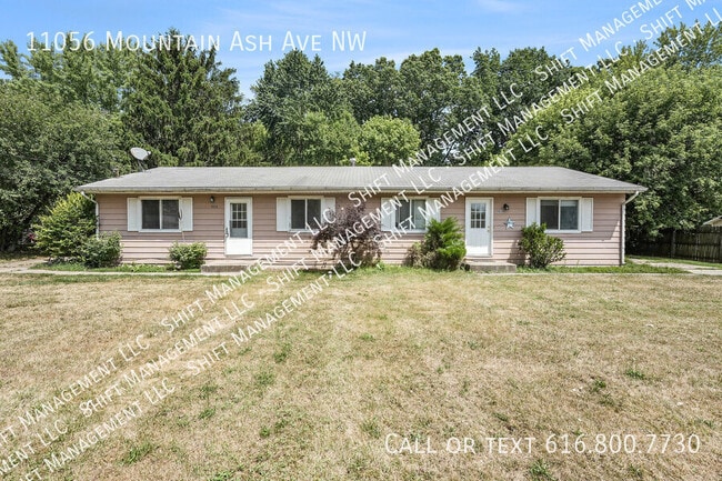 property at 11056 Mountain Ash Ave NW