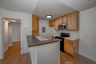 23515 Lyons Ave, Unit 201 in Santa Clarita, CA - Building Photo - Building Photo