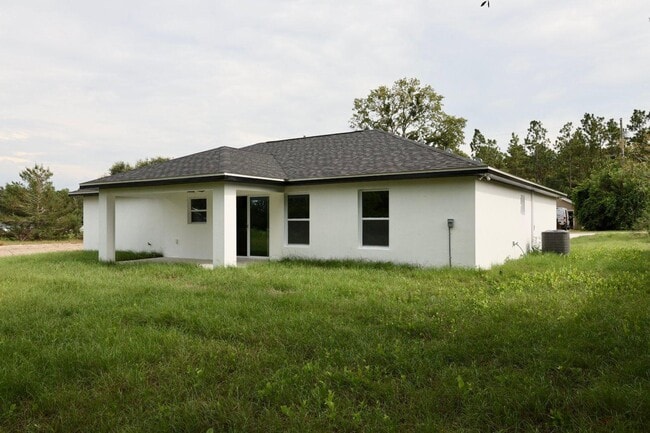 345 Malauka Loop in Ocklawaha, FL - Building Photo - Building Photo
