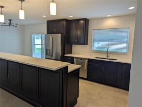 1180 Eden Isle Blvd NE in St. Petersburg, FL - Building Photo - Building Photo