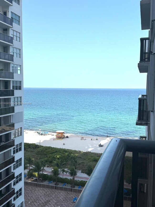 property at 6039 Collins Ave