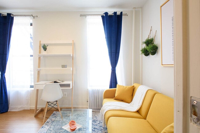 property at 402 E 11th St