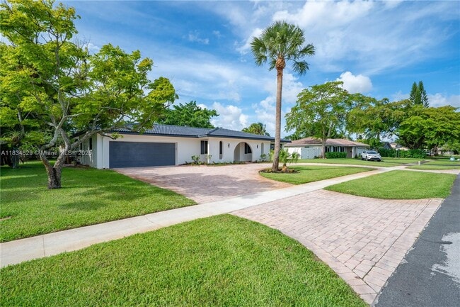 property at 6141 SW 9th St