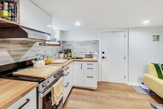 2009 Gerrard St E in Toronto, ON - Building Photo - Building Photo