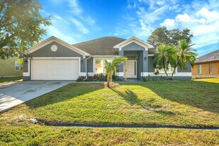 2518 SE Cooper Ln in Port St. Lucie, FL - Building Photo