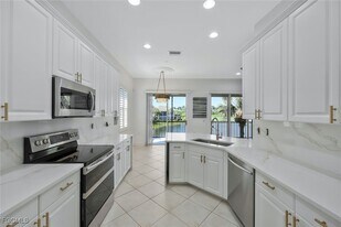 10085 Valiant Ct in Miromar Lakes, FL - Building Photo