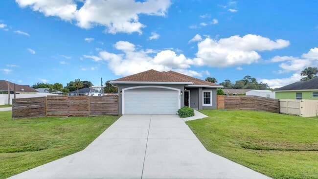 2001 SW Aguero St in Port St. Lucie, FL - Building Photo - Building Photo