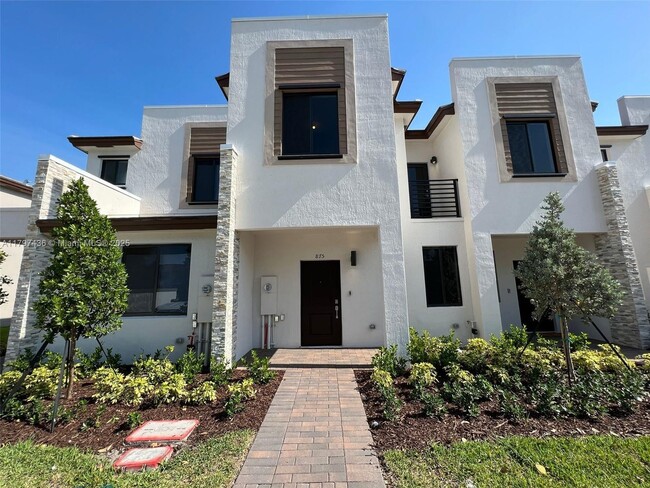 property at 875 NE 211th St