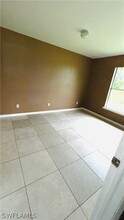 1107 Harry Ave S in Lehigh Acres, FL - Building Photo - Building Photo