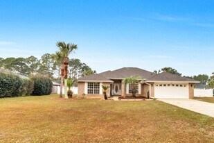 2427 Tumbleweed Dr in Gulf Breeze, FL - Building Photo