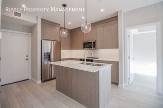 6 Merganser Dr W in Chestermere, AB - Building Photo - Building Photo