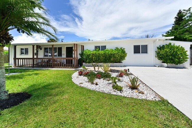 property at 5702 SE Laguna Ave