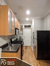 542 W Surf St, Unit GDN in Chicago, IL - Building Photo - Building Photo