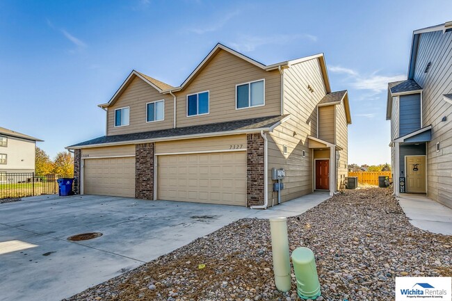 property at 7327 E 34th St N