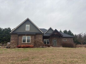 1240 N Austin Springs Rd in Piney Flats, TN - Building Photo