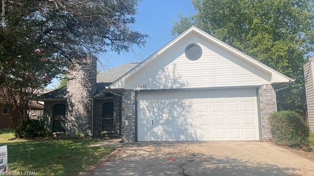 property at 6421 Woodcreek Trail