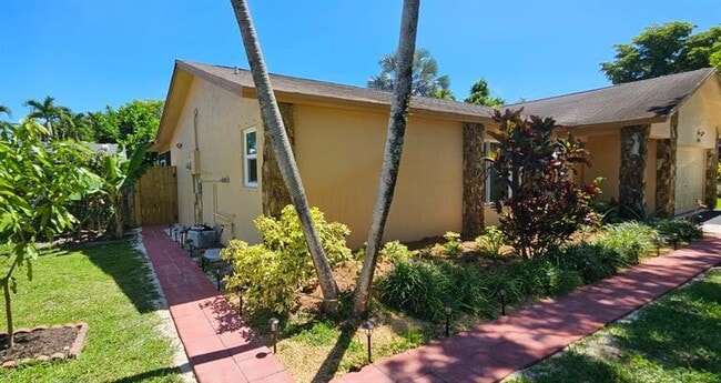 property at 9970 NW 24th St