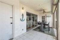 9486 Gulf Shore Dr, Unit A-202 in Naples, FL - Foto de edificio - Building Photo