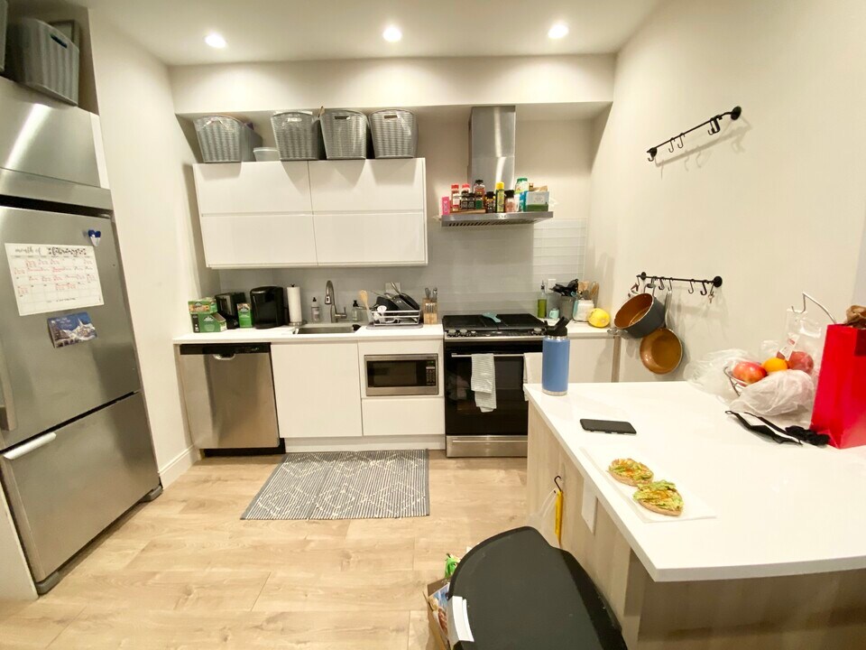 118 Buttonwood St, Unit #1 in Boston, MA - Building Photo