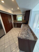 1205 White Pine Dr in Wellington, FL - Building Photo - Building Photo