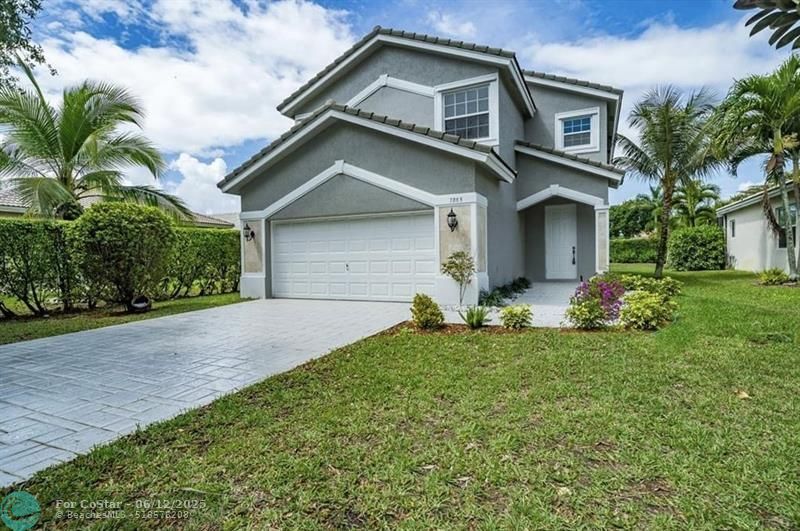 7803 NW 70th Ave in Parkland, FL - Building Photo