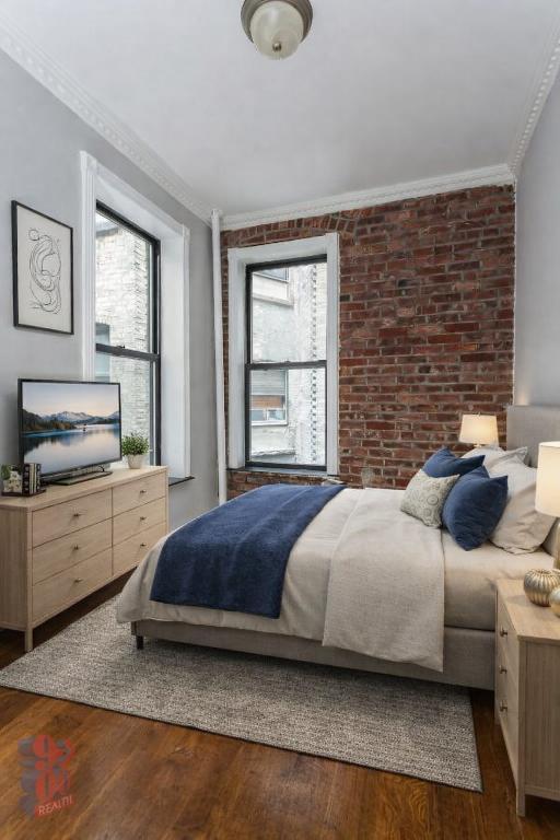 309 E 8th St in New York, NY - Building Photo - Building Photo