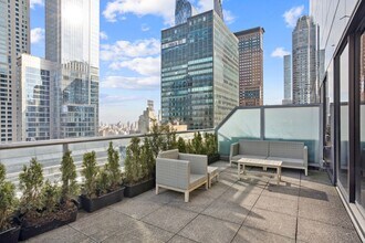 230 W 56th St in New York, NY - Building Photo - Building Photo