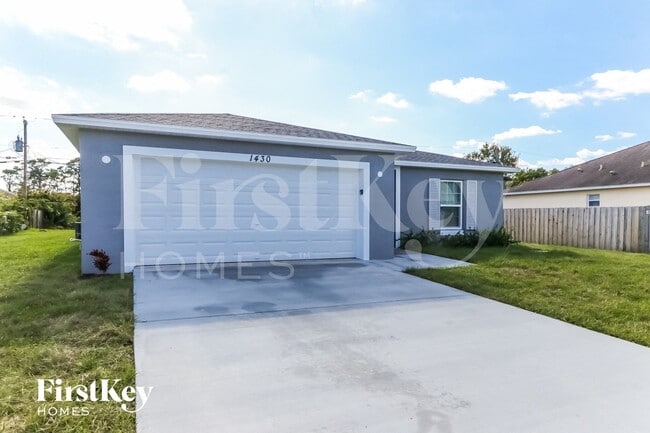 1430 SW Santiago Ave in Port St. Lucie, FL - Building Photo - Building Photo