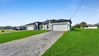 2405-2407 Xelda Ave N in Lehigh Acres, FL - Building Photo - Building Photo