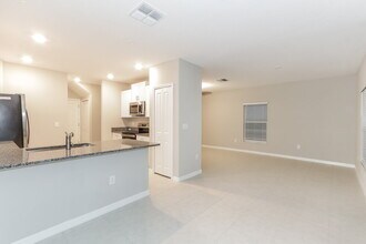 7314 Spring Snowflake Ave in Palm River-Clair Mel, FL - Building Photo - Building Photo