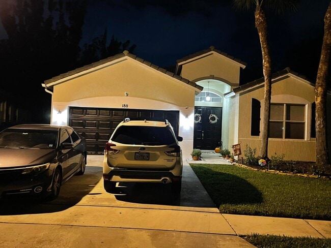 180 Seminole Lakes Dr in Royal Palm Beach, FL - Foto de edificio - Building Photo