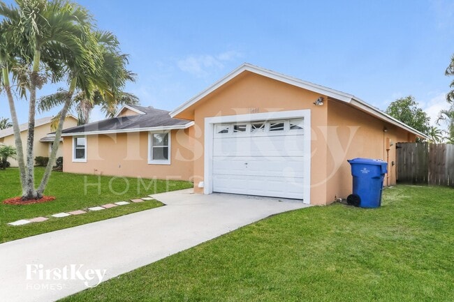 10404 Oliver Ln in Royal Palm Beach, FL - Foto de edificio - Building Photo