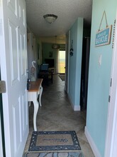 2390 Ocean Shore Blvd, Unit 104 in Ormond Beach, FL - Foto de edificio - Building Photo