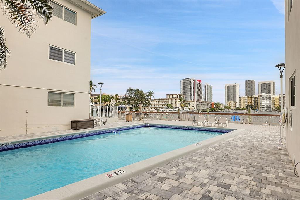 462 Golden Isles Dr, Unit 310 in Hallandale Beach, FL - Building Photo