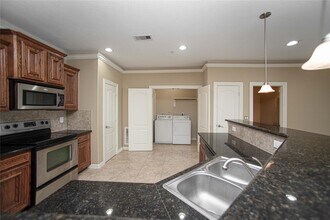 7037 Kingston Cove Ln in Willis, TX - Building Photo - Building Photo