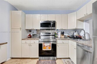 3050 NW 42nd Ave in Coconut Creek, FL - Building Photo - Building Photo