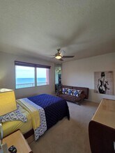 9900 S Thomas Dr in Panama City Beach, FL - Building Photo - Building Photo