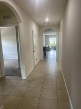 10817 Marble Brook Blvd, Unit 1204 in Lehigh Acres, FL - Building Photo - Building Photo
