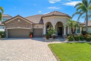 9489 Italia Way in Naples, FL - Building Photo