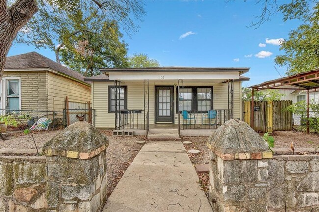 property at 1105 E 3rd St